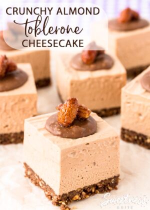 Square pieces of Toblerone cheesecake topped with melted Toblerone and a honey roasted almond.