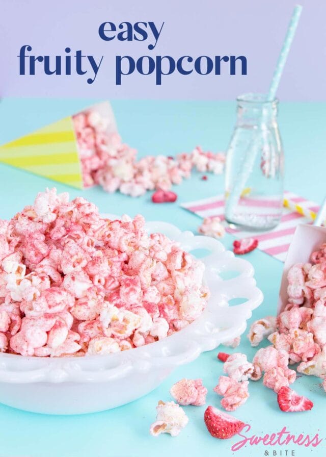 White bowl of pink fruit-flavoured popcorn.