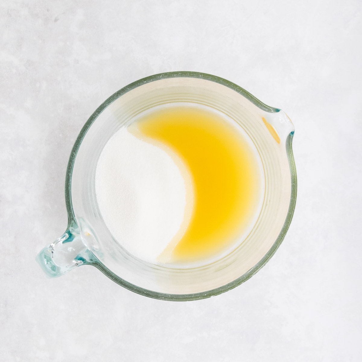 Lemon juice and caster sugar in a small pyrex jug. 