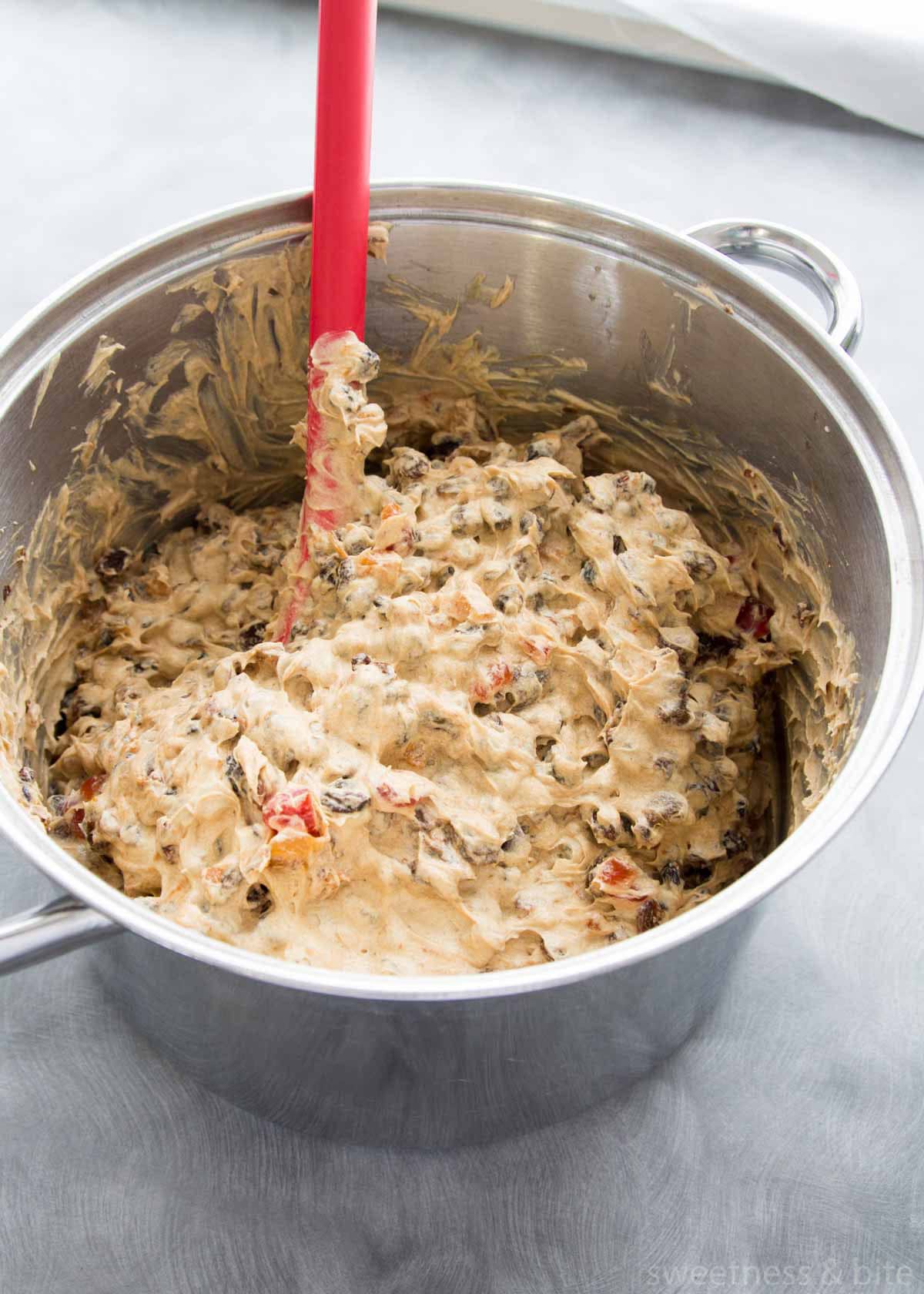 Fruit cake batter in a large saucepan.