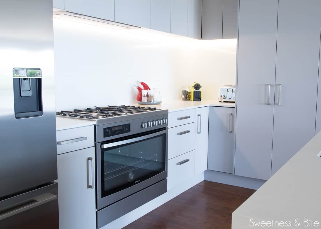 The LED lighting strip under the upper cabinets over the stove.