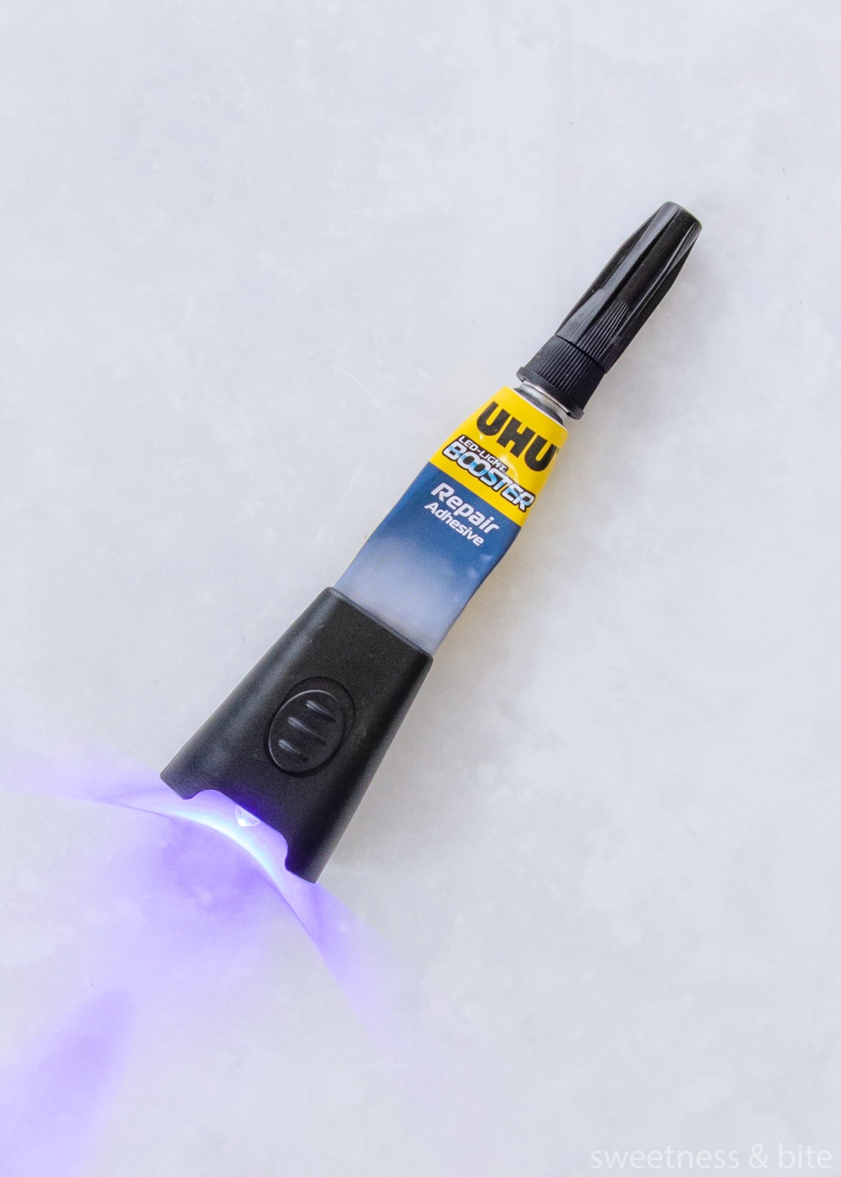 A tube of Uhu blue light glue.